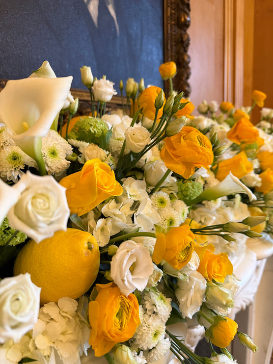 yellow and white flowers with lemon fruit