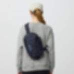 a lady with a Fjallraven - Skule Sling 6 on her back