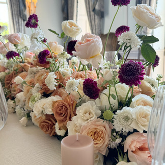 peach wine and burgundy flowers with iced latte ester and erik candles