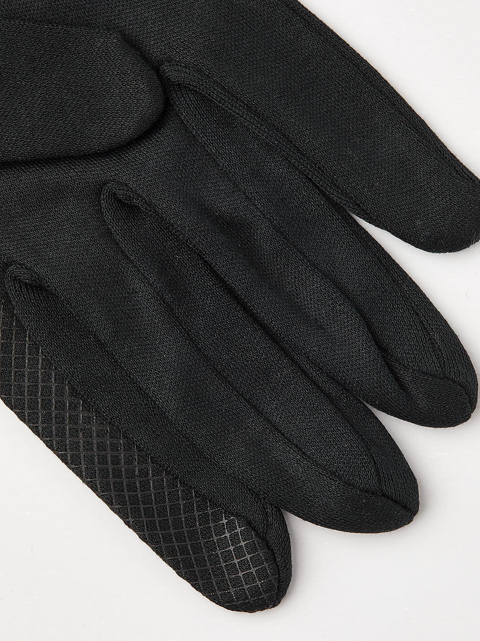 close up of finger on a pair of Hestra Silk Liner Touch Point 5-finger