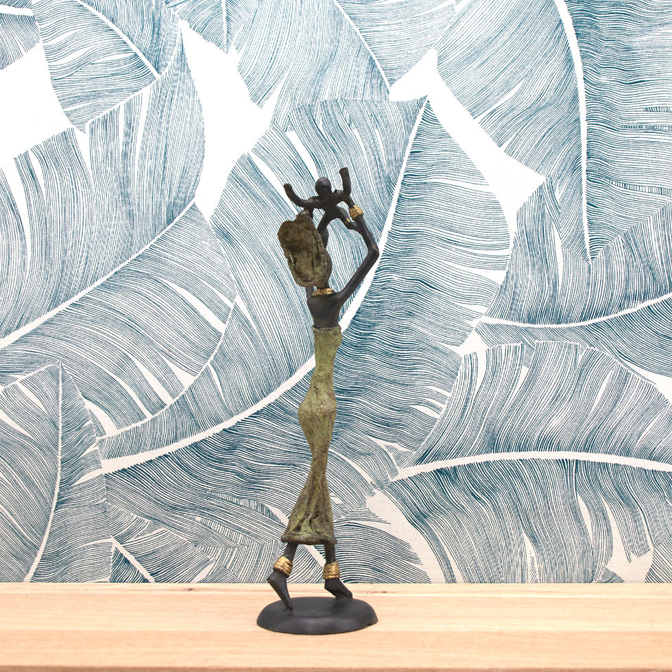 Thumbnail: Femme en robe tilleul portant son enfant à bout de bras  bronze à la cire perdue