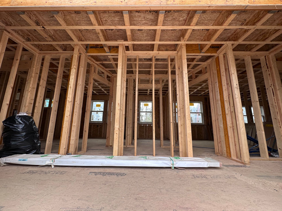Wooden framework of a building under construction.