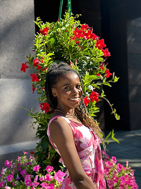 A beautiful lady smiling at the camera