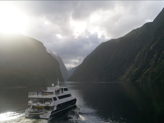 Beautiful sunset inside the stunning Fiordland region of New Zealand