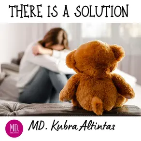 a woman sitting with her head down, comforted by a teddy bear on the coach, representing emotional support and vulnerability.