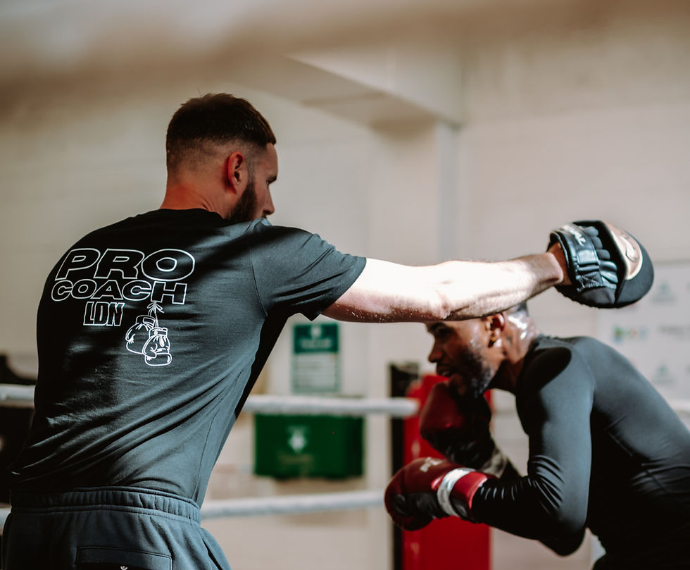 Eye-level view of a boxer practicing punches on a heavy bag in a gym