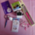 Sewing clips, tally counter, needles, crochet hook and Snail stitch marker
