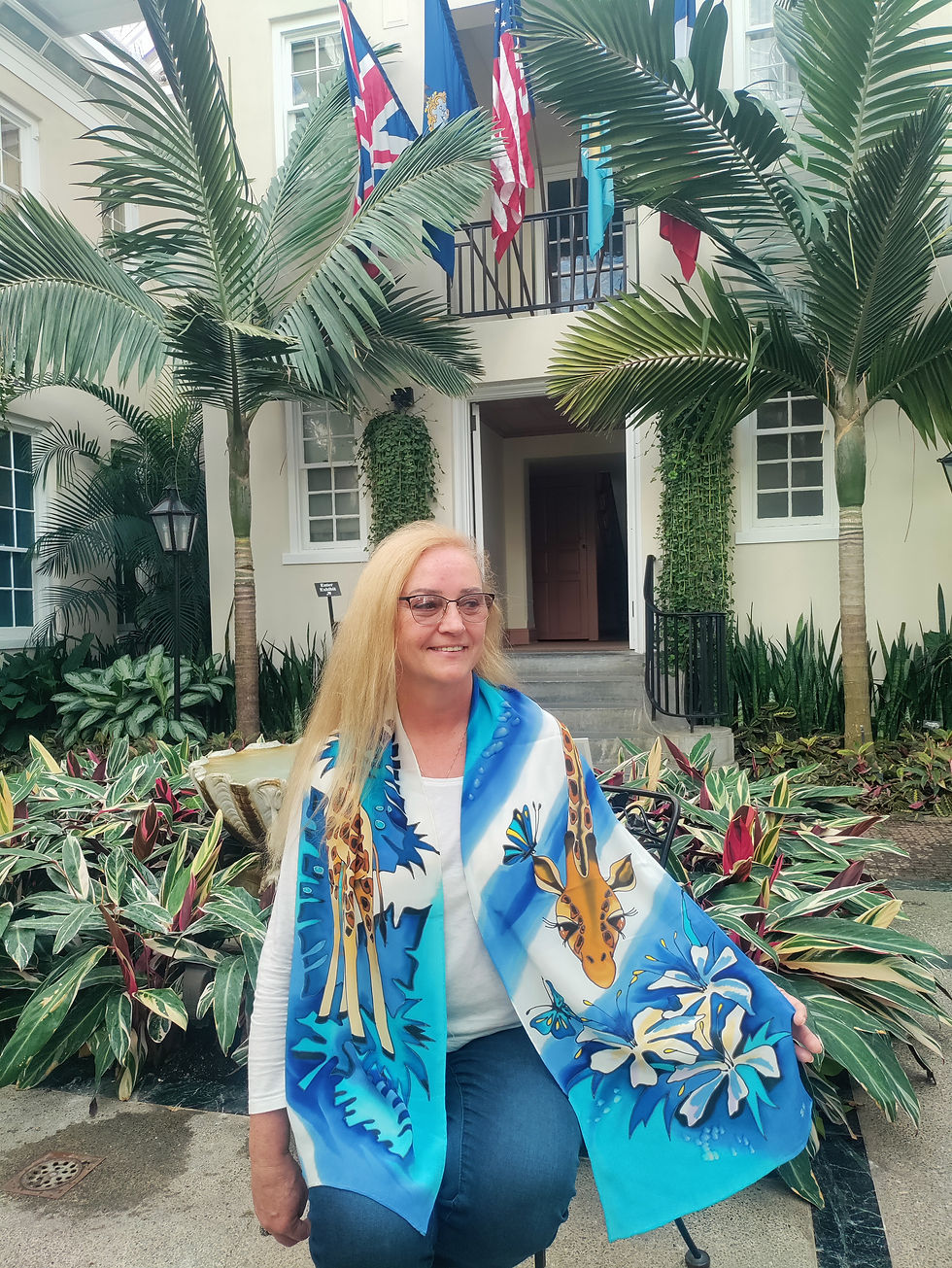 Thumbnail: Long blue silk scarf with giraffe and botanical pattern, original batik artwork shown vertically