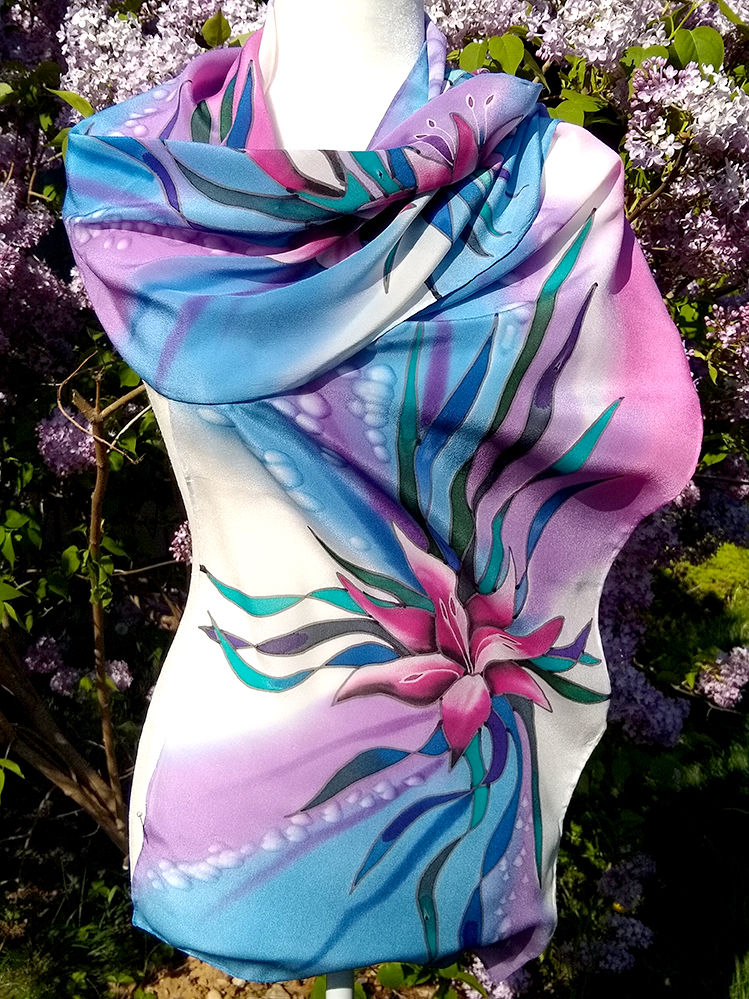 Thumbnail: Side view of Purple and Blue Floral Silk Scarf with Lilies wrapped around the neck