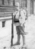The Type 38 rifle with its bayonet attached is just as tall as the soldier weilding it.