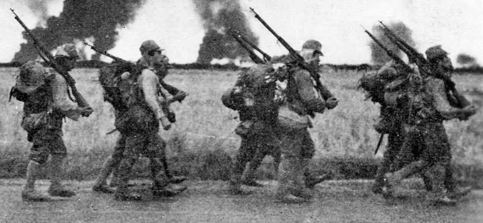 Japanese soldiers on the march in the Philippines.