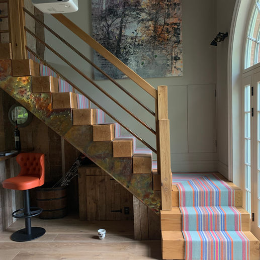 Roager Oates Chatham Azure stair runner fitted to oak sleeper staircase