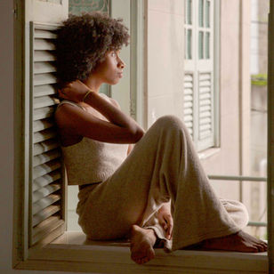 Woman looking out the window