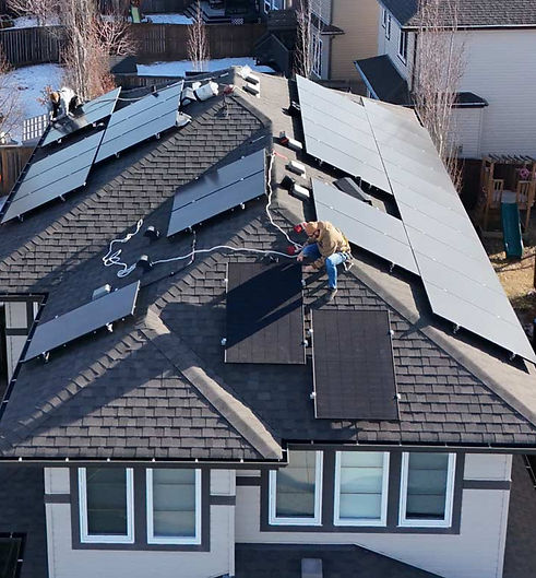 Solar panels being installed on a home in Edmonton