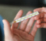 thermometer in a hand