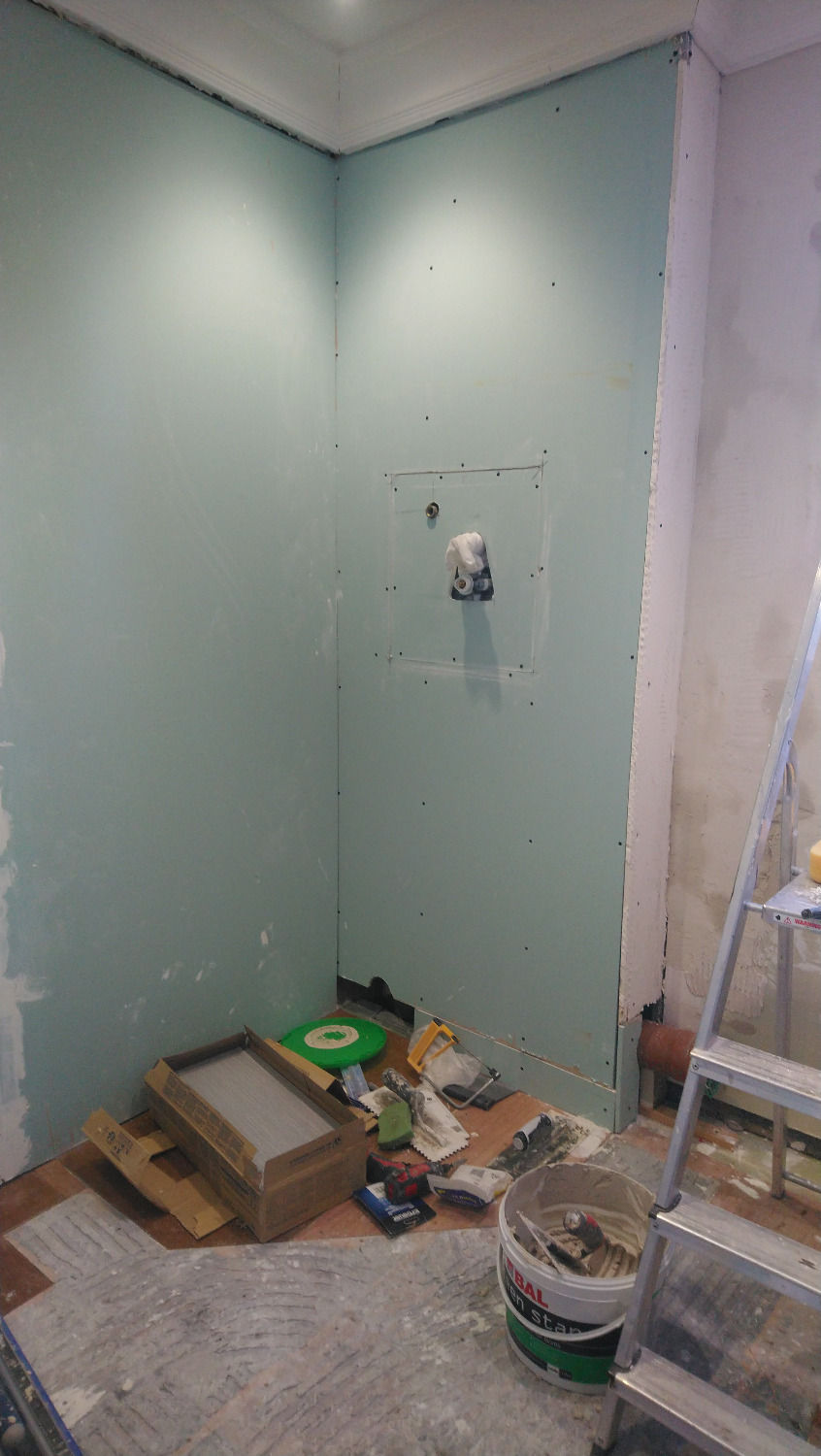 Moisture resistant plasterboard