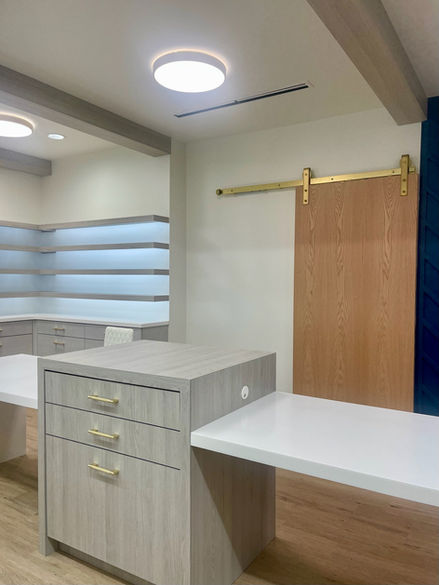 Modern office interior design with wood and brass accents