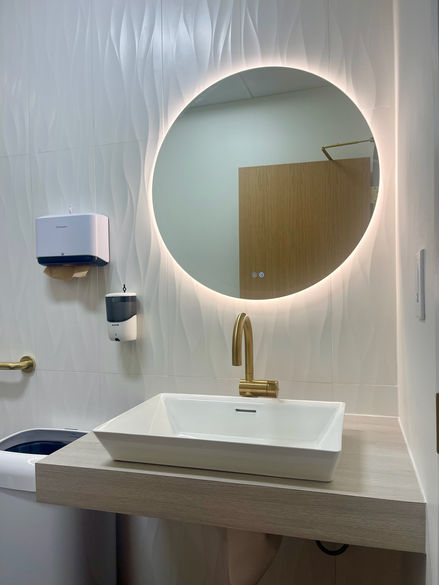 Modern bathroom sink with round LED mirror