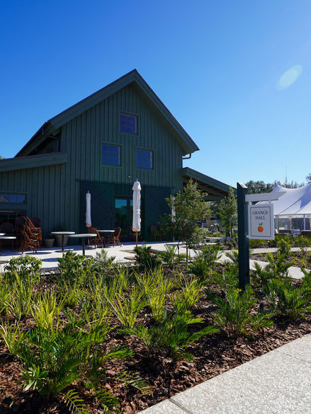 Modern building exterior with outdoor seating