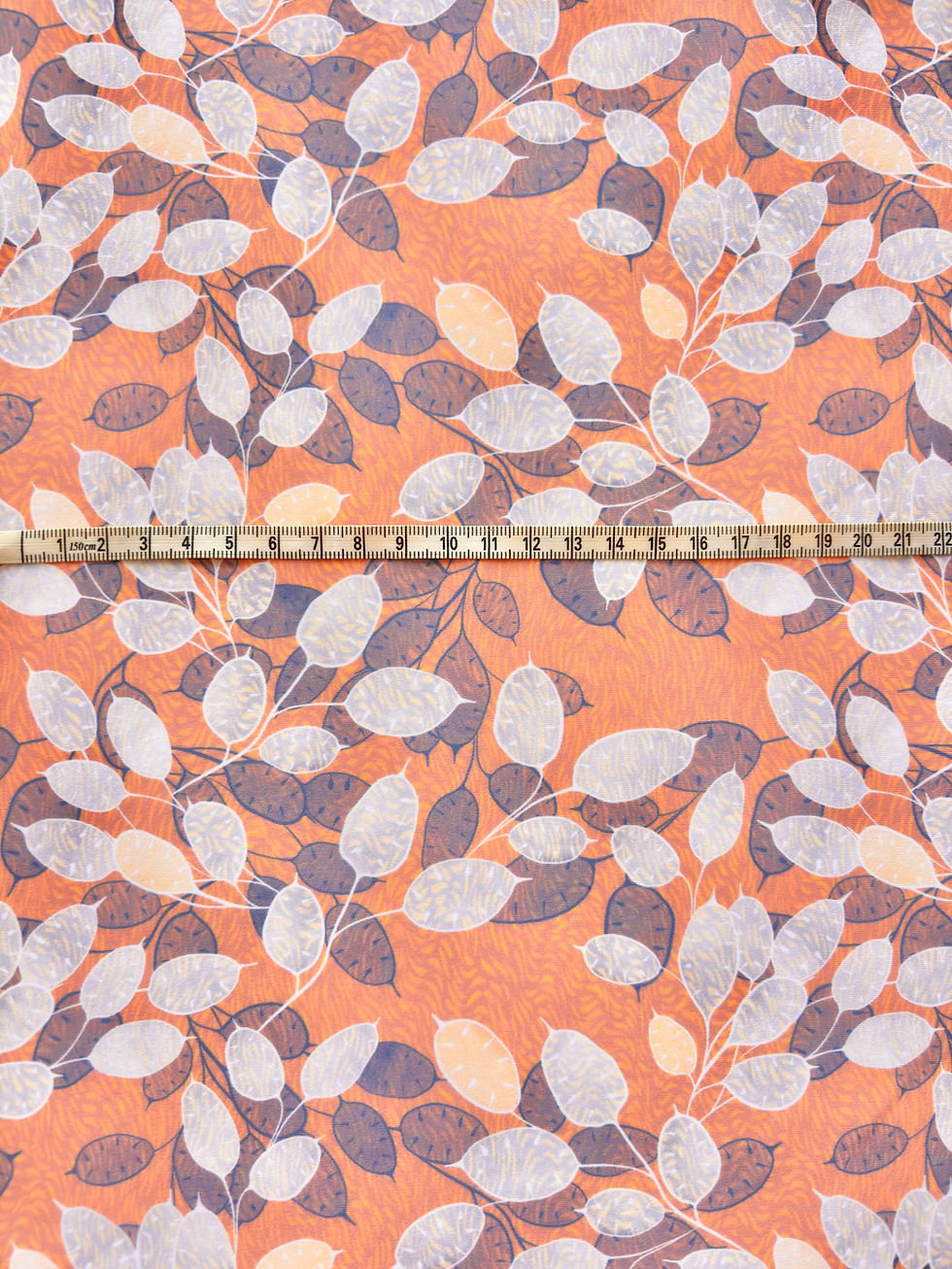 Miniature : Tissu lycra Lunaria imbris motif végétal feuille de monnaie du pape imprimé bleu, orange et blanc - mesure du motif