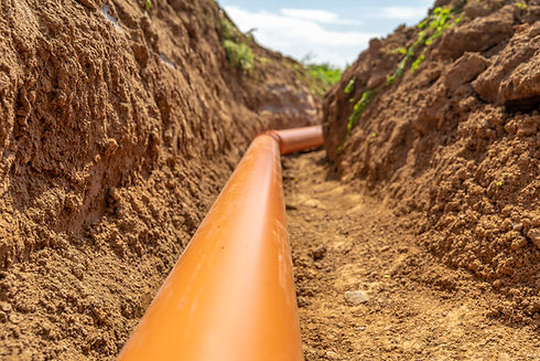 Plastic pipes in the ground for rainwater drainage.jpg