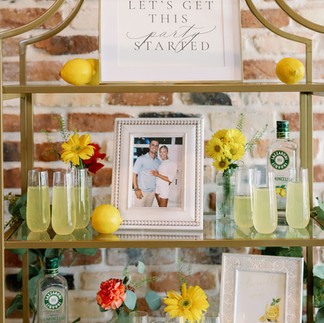 colorful wedding decor with lemons and limoncello
