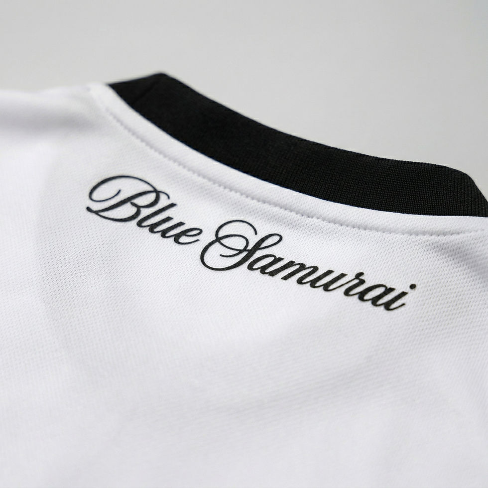Close-up of “Blue Samurai” text on collar of Japan custom soccer jersey with detailed finish