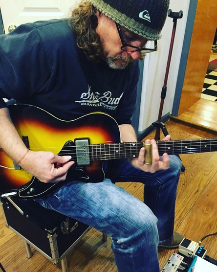 Mike Playing Guitar.png