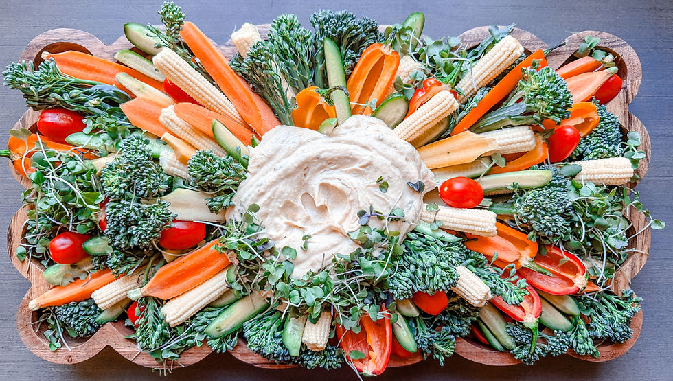 Veggie charcuterie board ideas with hummus and crudités