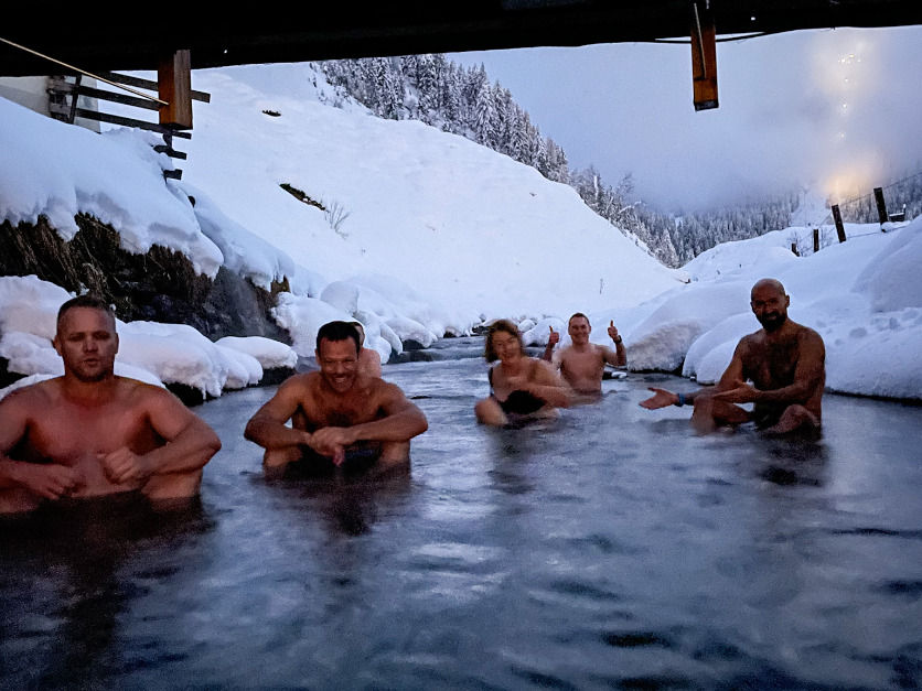 The group is having the first cold dip on day one of the glacier iceswimworkshop with Josef Köberl 