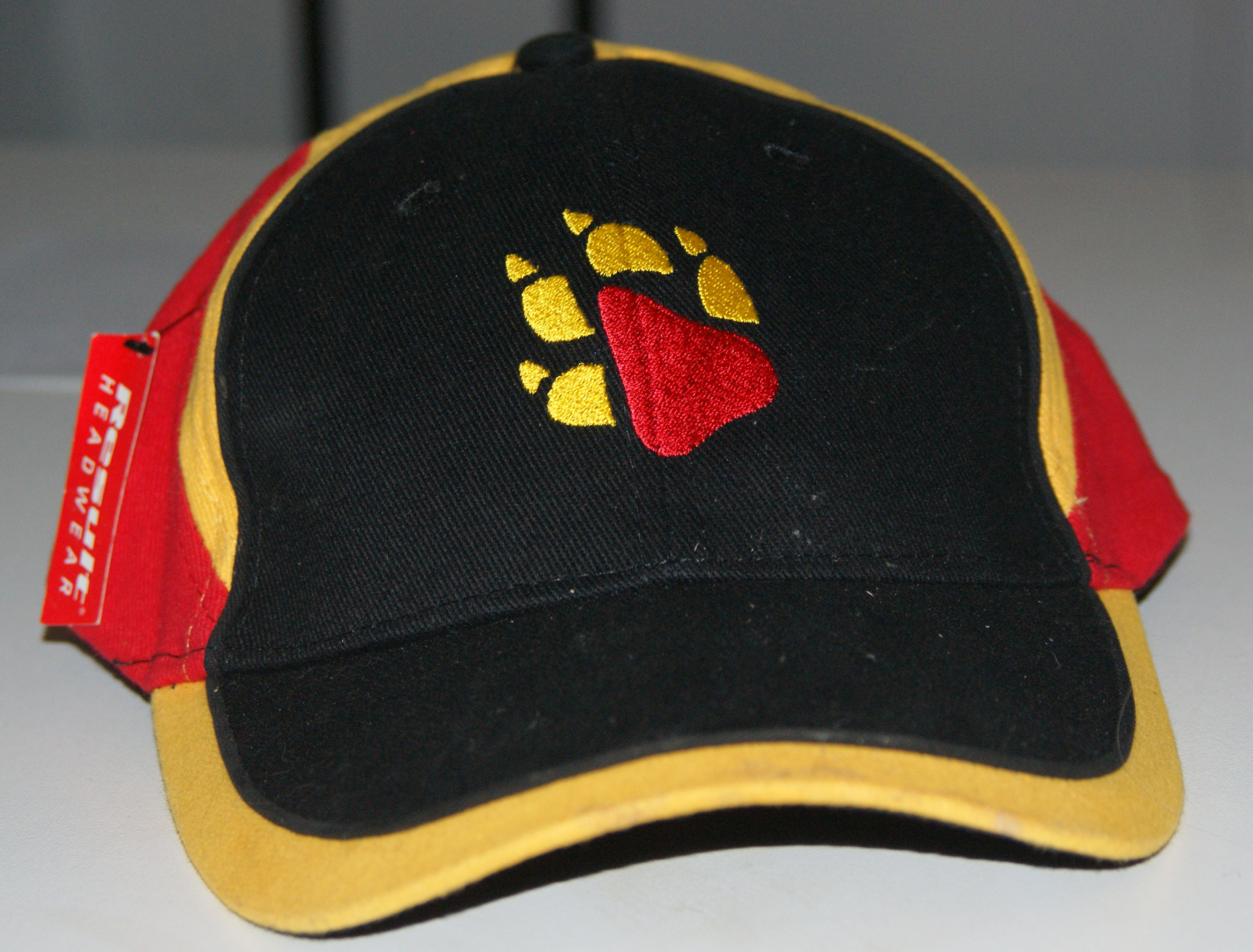 Casquette noir/jaune/rouge