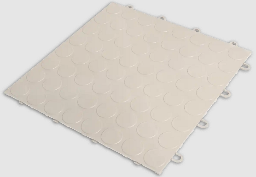 Thumbnail: Light beige interlocking tile with raised circle pattern