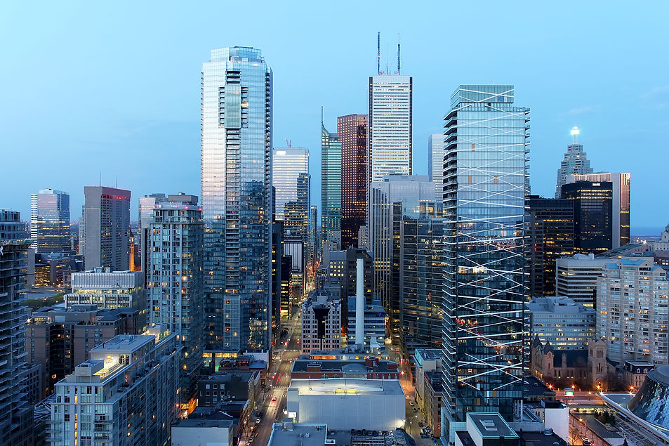 Skyscrapers in downtown Toronto financial district at dusk.jpg