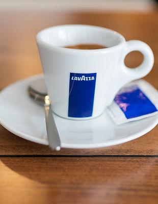 ZAGREB, CROATIA - FEBRUARY 4, 2017_ Lavazza espresso  cup served on a plate with sugar and