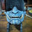 Thumbnail: Demi-masque samouraï bleu avec détails dorés. Style Dark Oni furtif et luxueux pour décoration murale.