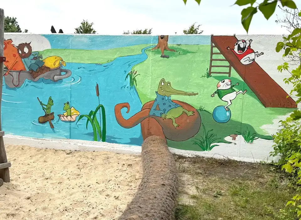bemalte Wand am Spielplatz des Kinderschutzbundes