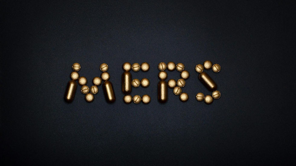 Gold pills arranged to spell 'MERS' on a black background, highlighting healthcare and viral themes.