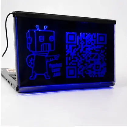 Thumbnail: Blue illuminated QR code sign mounted on DJ laptop, edge-lit acrylic display for live events and performances