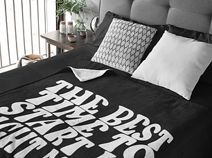 mockup-of-a-blanket-placed-over-a-bed-31314.png