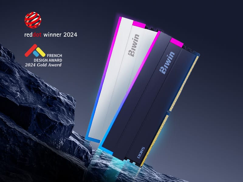 DDR5 RAM sticks with glowing pink and blue edges on rocky surface, Red Dot and French Design Award 2024 logos in upper left.