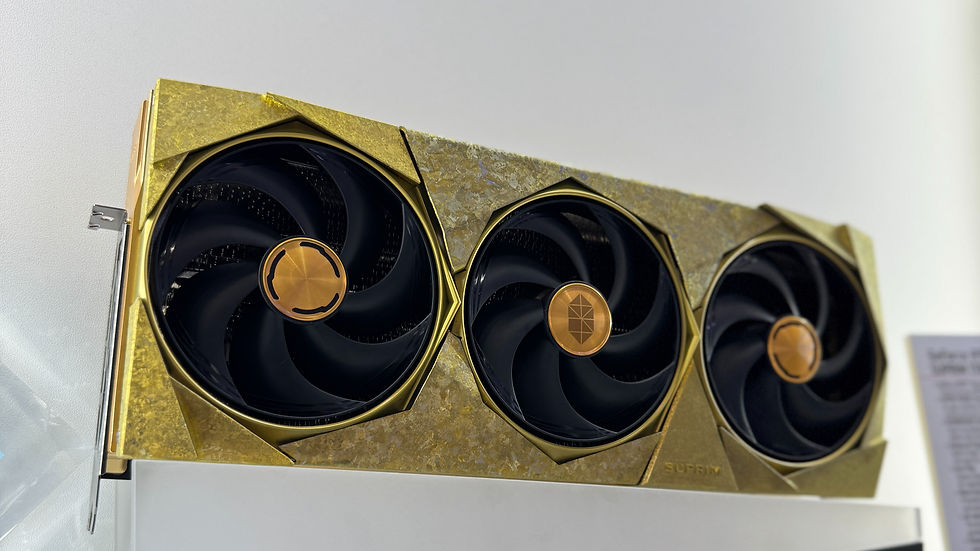 Graphics card with gold accents and three black fans in a white setting. Text "SUPRIM" is visible. Modern and sleek design.