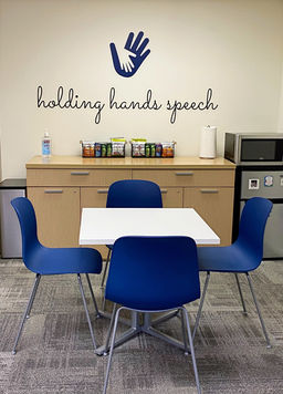 Cafe table in the Holding Hands Speech waiting area