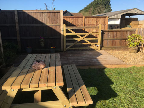 Enclosed outdoor seating area at the Picture House with wooden decking