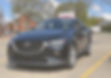 Colette's black Mazda