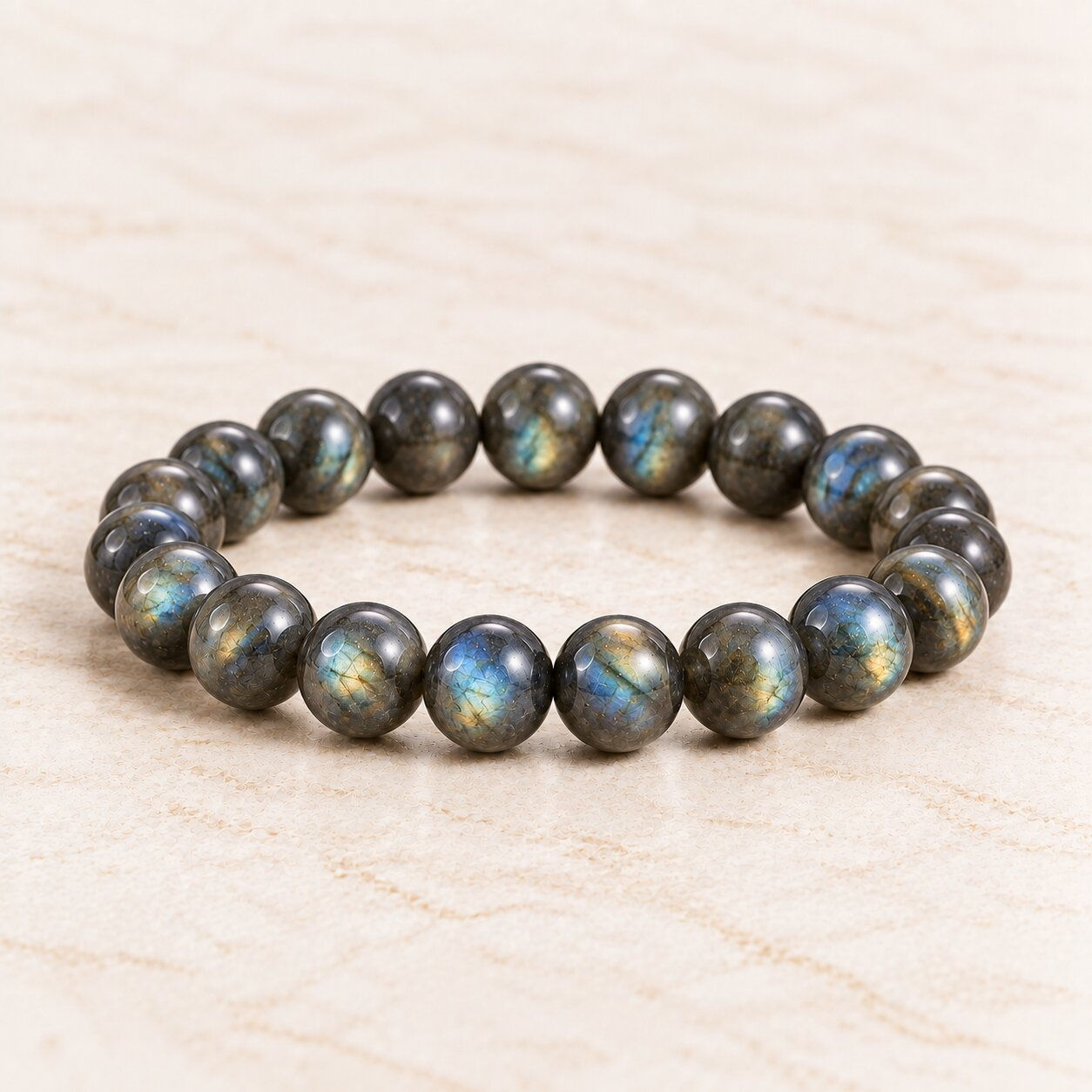 Labradorite bracelet with blue and gold flash to trust your gut by Sanskritii Sethi Global front view