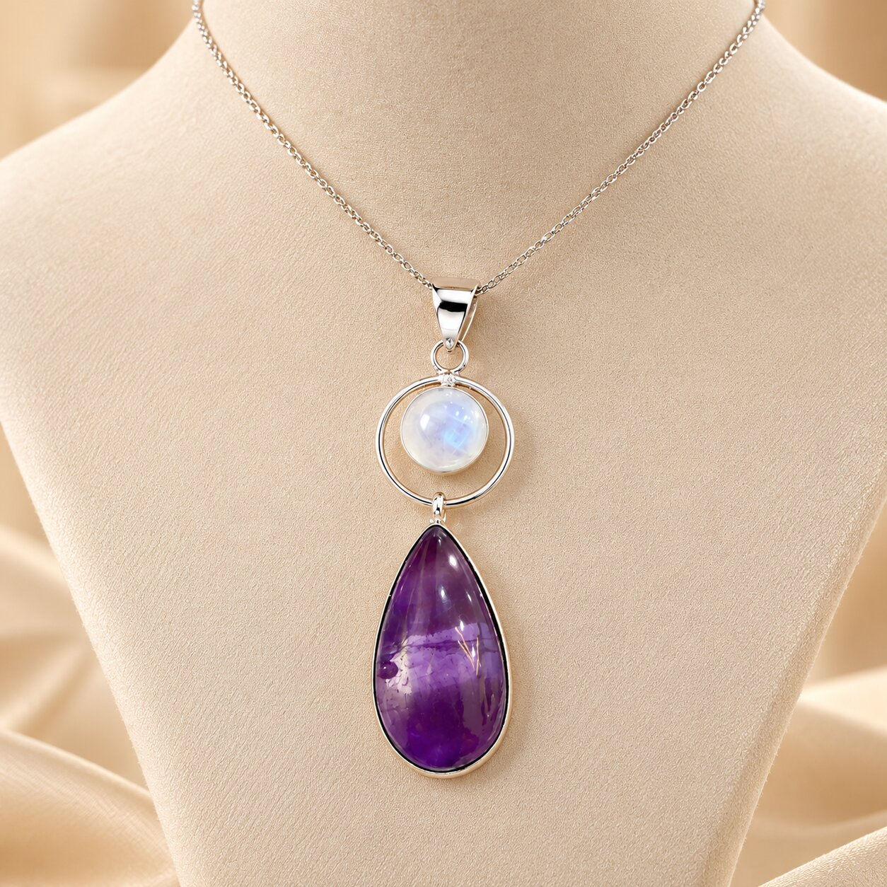 Peaceful Sleep amethyst and moonstone teardrop pendant in 92.5 silver Sanskritii Sethi Global
