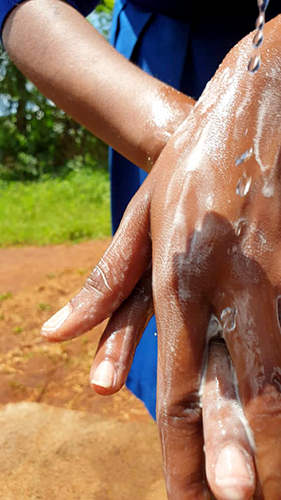 School child washing hands in Manyara, Tanzania