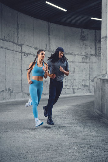 2 sport models running in a parking garage.