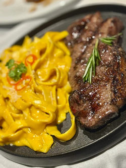 Tallarines a la Huancaina con Corte de Carne
