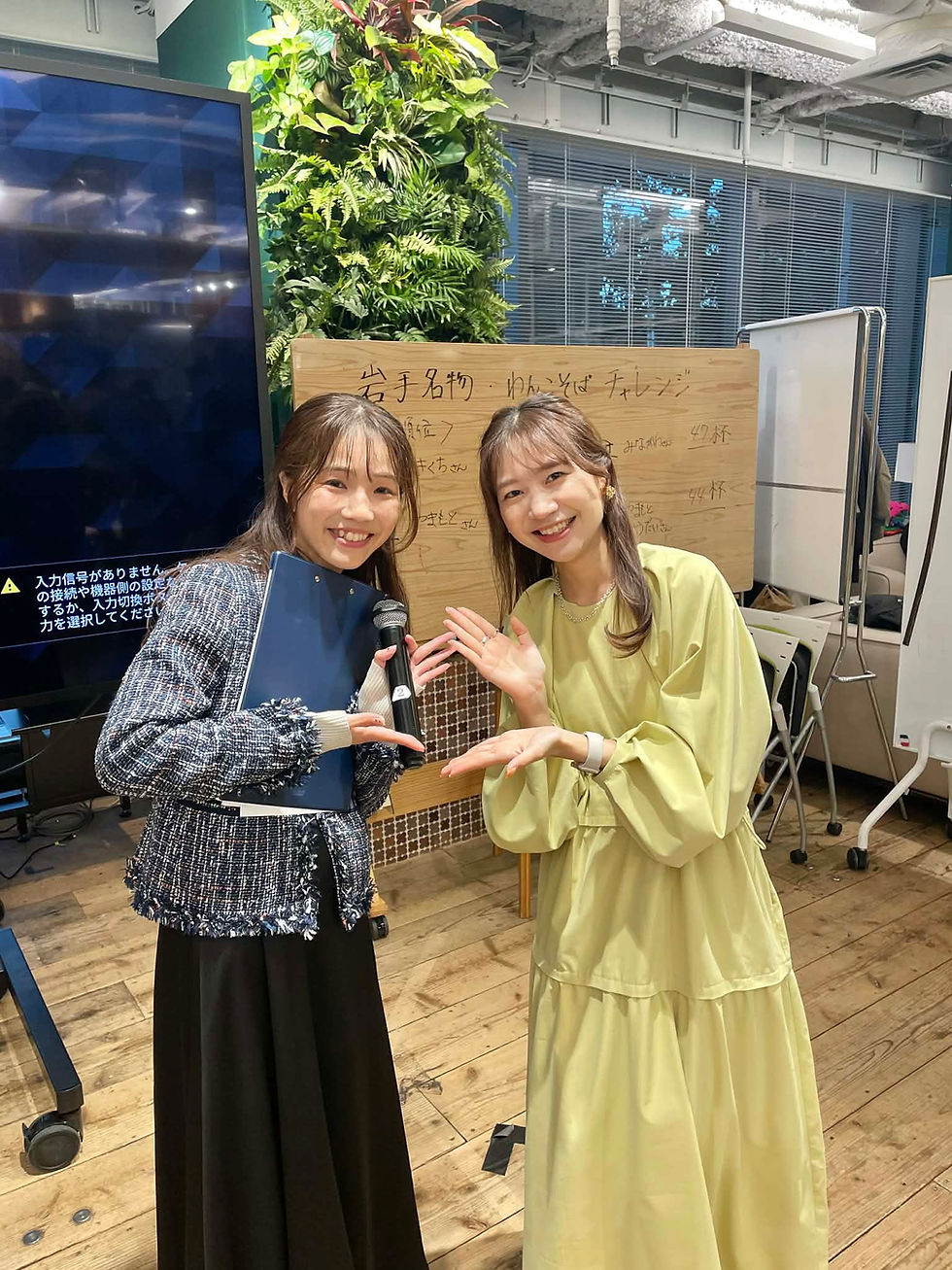 岩手のイベントで司会する女性